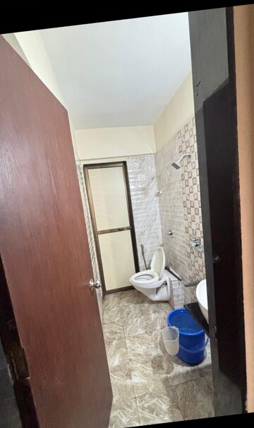 Bathroom in 2 BHK Apartment at Bhoomi Acres, Waghbil – for Rent