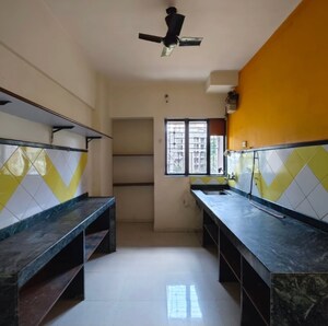 Kitchen in 2 BHK Apartment at Vasant Vihar – for Sale