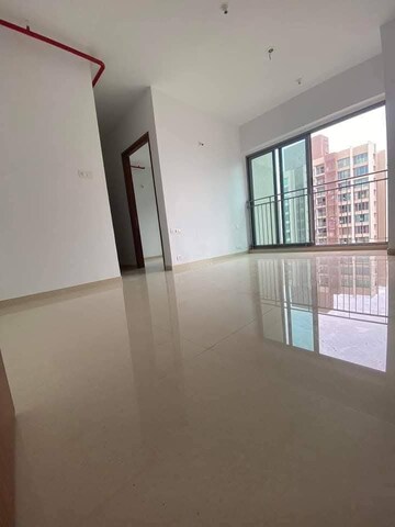 Living Room in 2 BHK Apartment at Kalpataru Sunrise Grande, Kolshet Road – for Rent
