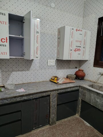 Kitchen in 3 BHK Builder Floor at Dhakoli – for Sale