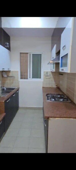 Kitchen in 2.5 BHK Apartment at Mahagun Moderne, Sector 78 – for Sale
