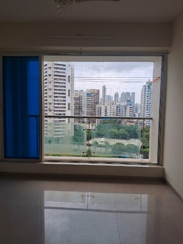 Living Room in 2 BHK Apartment at Dosti Flamingos, Parel – for Rent