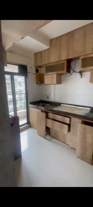 Kitchen in 2 BHK Apartment at Sanghvi S3 Ecocity Spring, Mira Road – for Rent