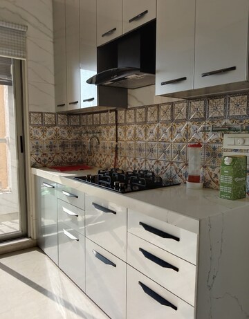 Kitchen in 3 BHK Apartment at Hiranandani Skylark Enclave, Ghodbunder Road – for Rent