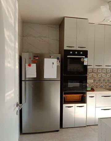Kitchen in 3 BHK Apartment at Hiranandani Skylark Enclave, Ghodbunder Road – for Rent