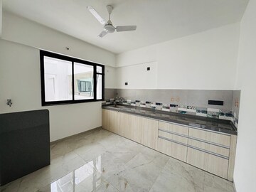 Kitchen in 2 BHK Apartment at Unique Youtopia, Kharadi – for Rent