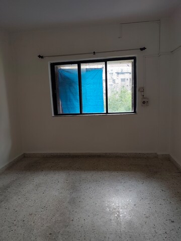 Bedroom in 2 BHK Apartment at Flower Valley Complex Valivali, Valivali – for Rent