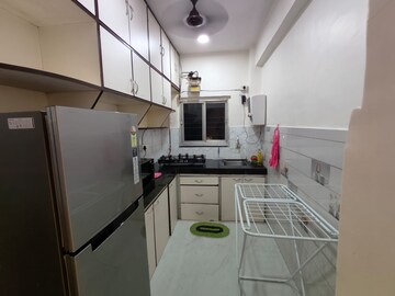Kitchen in 2 BHK Apartment at Indus CHS, Andheri West – for Rent