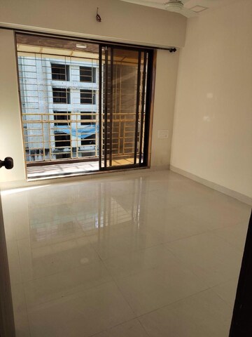 Room in 2 BHK Apartment at Gurukrupa Marina Enclave, Malad West – for Rent