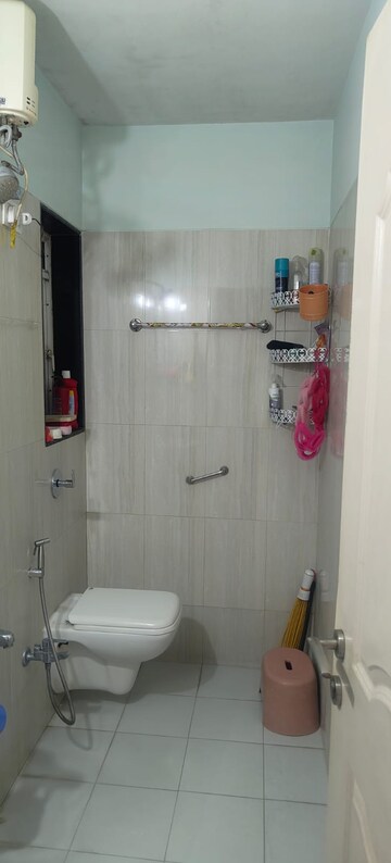 Bathroom in 2 BHK Apartment at Puranik City, Kasarvadavali – for Rent