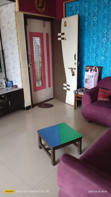 Living Room in 2 BHK Apartment at Deepal CHS, Dombivli West – for Rent