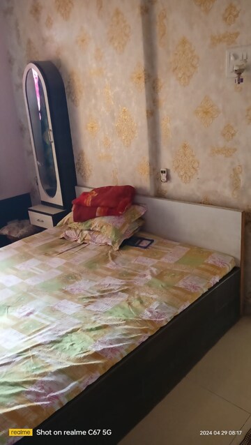 Bedroom in 2 BHK Apartment at Om Sai Ganesh CHS, Dombivli West – for Rent