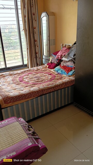 Bedroom in 2 BHK Apartment at Om Sai Ganesh CHS, Dombivli West – for Rent