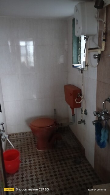 Bathroom in 2 BHK Apartment at Om Sai Ganesh CHS, Dombivli West – for Rent