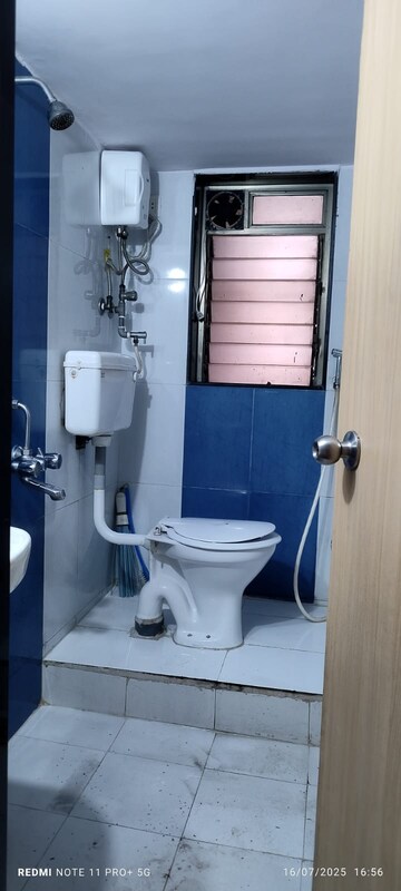 Bathroom in 1 BHK Apartment at Raunak Sai Dham Towers, Kandivali West – for Rent