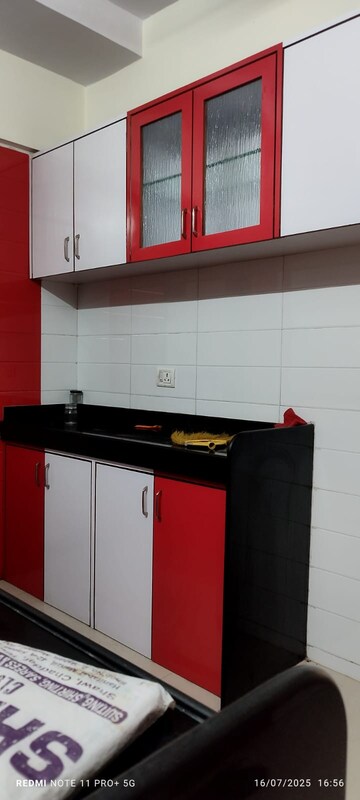 Kitchen in 1 BHK Apartment at Raunak Sai Dham Towers, Kandivali West – for Rent
