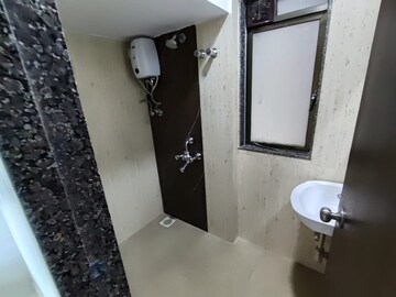 Bathroom in 2 BHK Apartment at Lotus Unity, Versova – for Rent