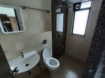 Bathroom in 2 BHK Apartment at Lotus Unity, Versova – for Rent