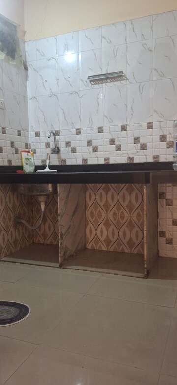 Kitchen in 1 BHK Apartment at Chamunda Daffodils, Ghansoli – for Rent