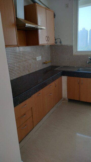 Kitchen in 2 BHK Apartment at Great Value Sharanam, Sector 107 – for Rent