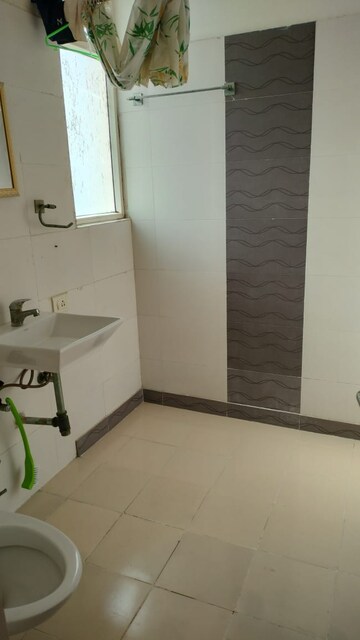 Bathroom in 2 BHK Apartment at Great Value Sharanam, Sector 107 – for Rent