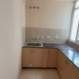 Kitchen in 2 BHK Apartment at Amrapali Dream Valley, Amrapali Dream Valley – for Sale