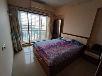 Bedroom in 2 BHK Apartment at Raj Rudraksha, Dahisar East – for Rent