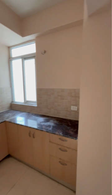 Kitchen in 2 BHK Apartment at Amrapali Dream Valley, Amrapali Dream Valley – for Sale
