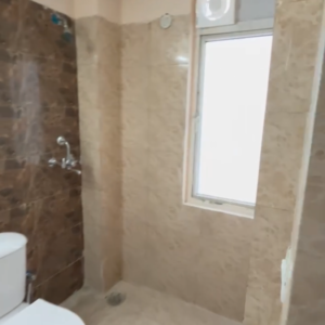 Bathroom in 3 BHK Apartment at Amrapali Dream Valley, Amrapali Dream Valley – for Sale