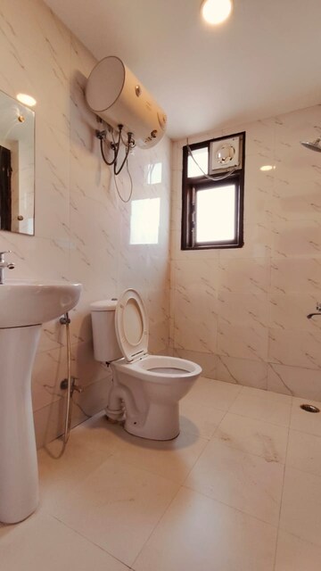 Bathroom in 2 BHK Apartment at Pareena Laxmi Apartments, Sector 99 – for Sale