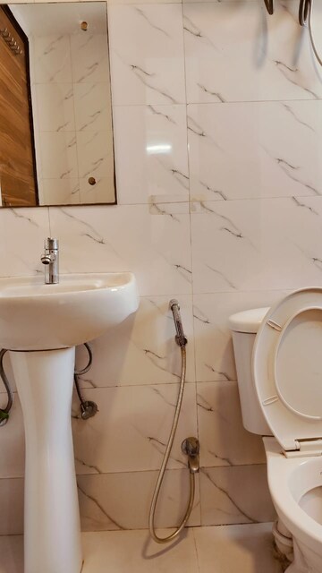Bathroom in 2 BHK Apartment at Pareena Laxmi Apartments, Sector 99 – for Sale