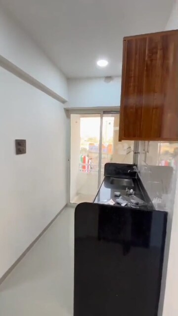 Kitchen in 1 BHK Apartment at Seven Eleven Apna Ghar Phase III, Mira Road – for Sale