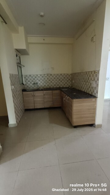 Kitchen in 2 BHK Apartment at Gaur City 2 - 12th Avenue, Sector 16c Greater Noida – for Rent