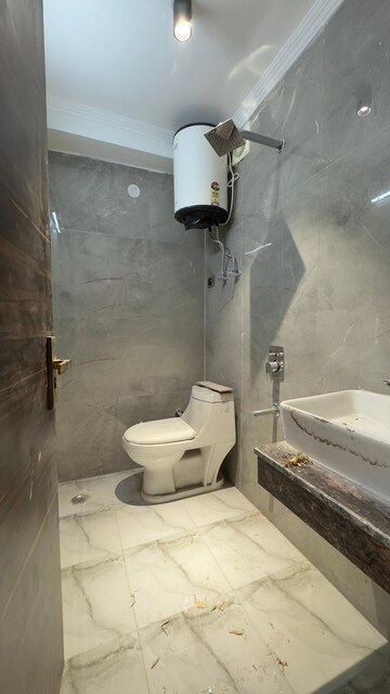 Bathroom in 1 BHK Builder Floor at Palm Residency Chhatarpur, Chattarpur – for Rent