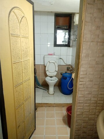 Bathroom in 2 BHK Apartment at Gautam Centre, Kopri – for Rent