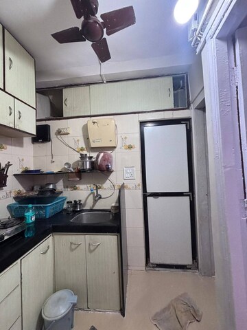 Kitchen in 1.5 BHK Apartment at Andheri West – for Rent