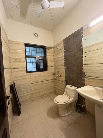 Bathroom in 3 BHK Builder Floor at Ansal Sushant Lok I, Sector 43 – for Rent