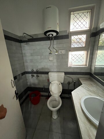 Bathroom in 3 BHK Builder Floor at Ansal Sushant Lok I, Sector 43 – for Rent