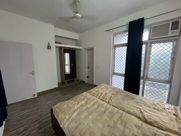 Bedroom in 3 BHK Builder Floor at Ansal Sushant Lok I, Sector 43 – for Rent