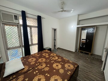 Bedroom in 3 BHK Builder Floor at Ansal Sushant Lok I, Sector 43 – for Rent