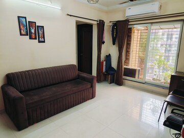 Bedroom in 2 BHK Apartment at Crystal Garden Estate CHS, Manpada – for Rent