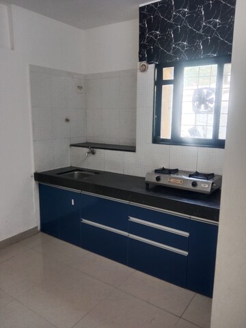 Kitchen in 2 BHK Apartment at Saanvi Sai Tej, Dhanori – for Rent
