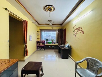 Living Room in 1 BHK Apartment at Sarvodaya Dutt CHS, Dombivli West – for Rent