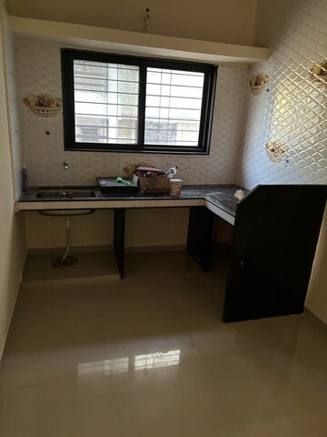 Kitchen in 2 BHK Apartment at Hirawadi – for Sale