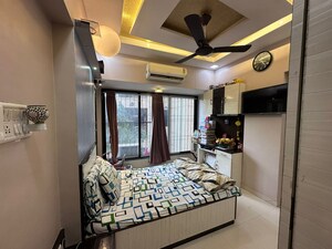 Bedroom in 6 BHK Apartment at Walkeshwar – for Sale