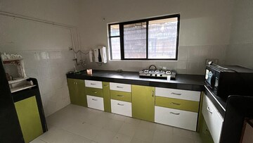 Kitchen in 3 BHK Apartment at Vidya Chs Aundh, Aundh – for Rent