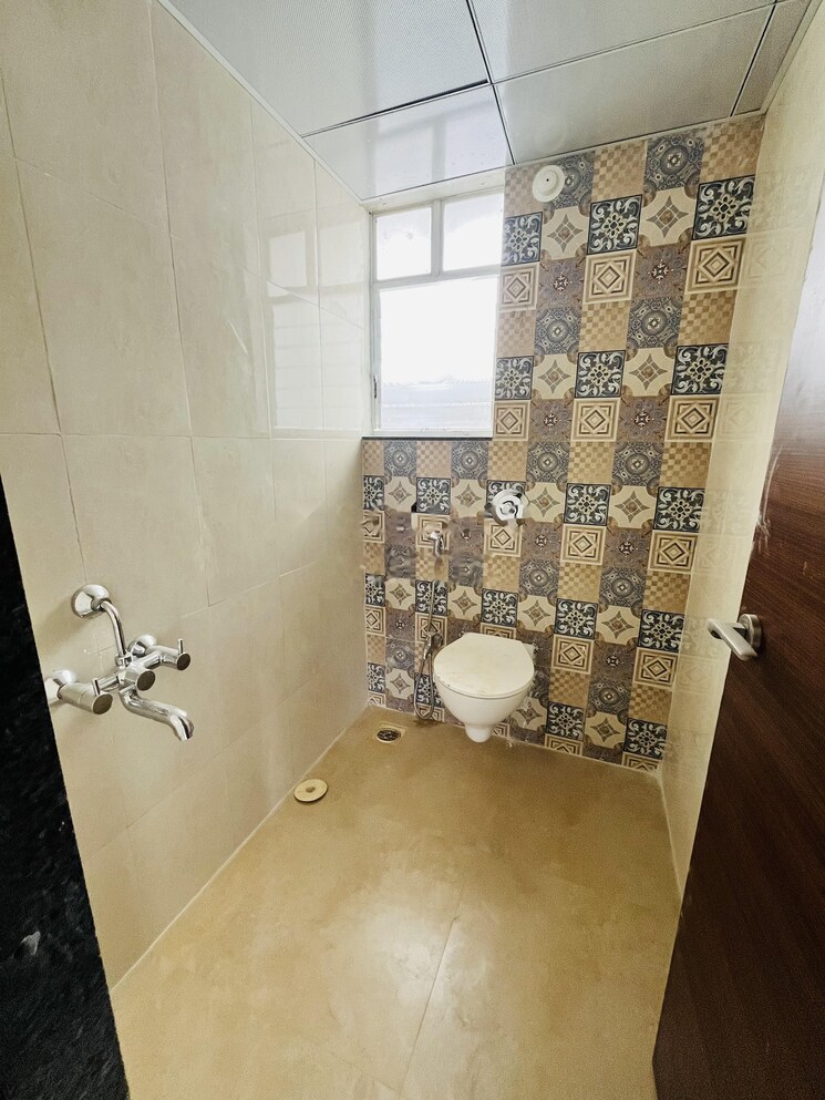 Bathroom, saheel-itrend-waterfront 2 Bedroom 712 Sq.Ft. Apartment In Ravet Pune 9055374