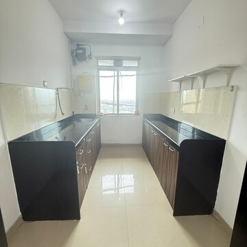 Kitchen/pantry in 2 BHK Apartment at Rustomjee Athena, Vrindavan Society – for Rent