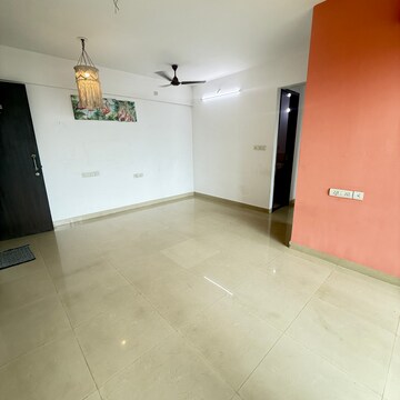 Living Room in 2 BHK Apartment at Rustomjee Athena, Vrindavan Society – for Rent