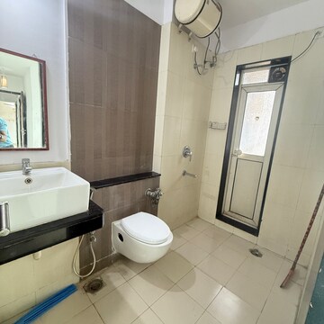 Attached Bathroom in 2 BHK Apartment at Rustomjee Athena, Vrindavan Society – for Rent